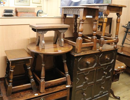 An oak circular table, two oak joint stools and two low stools